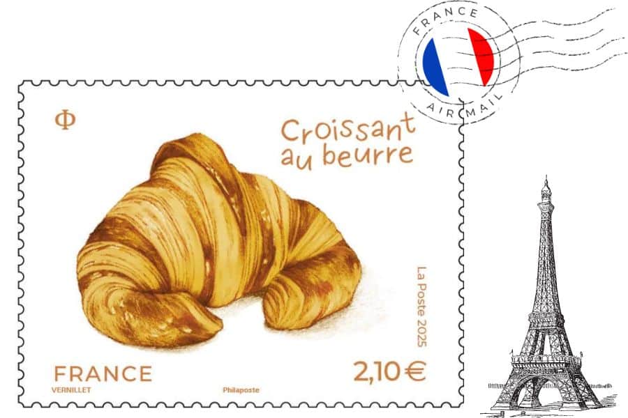 Illustrated Croissant au beurre stamp from France showing a golden, flaky butter croissant with hand-drawn text reading “Croissant au beurre.” The stamp is valued at 2.10 euros, marked “La Poste 2025,” and features a Paris-themed postmark with the Eiffel Tower and French flag colors.